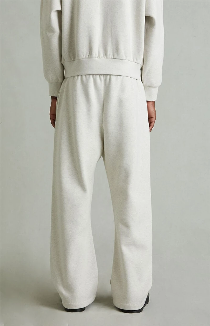 Fear of God ESSENTIALS Heather Oatmeal Fleece Flare Sweatpants