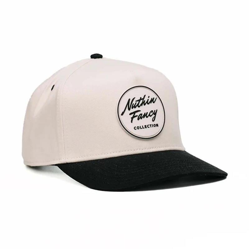Comus Two Toned Trucker Hat in White and Black