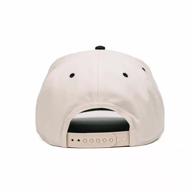 Comus Two Toned Trucker Hat in White and Black