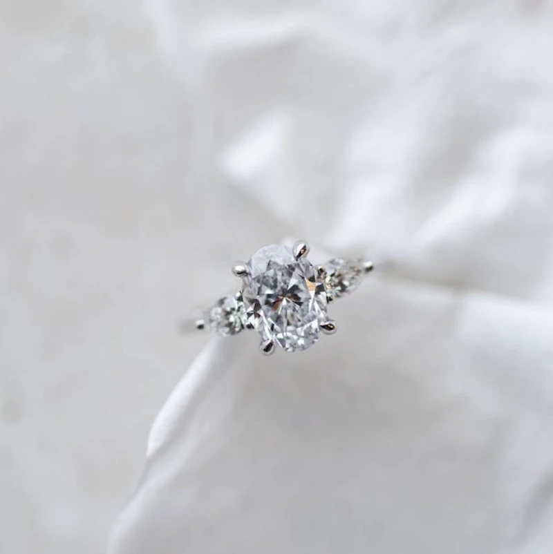 Oval Trilogy Engagement Ring with 2.56 Carat TW of Diamonds in 18kt White Gold