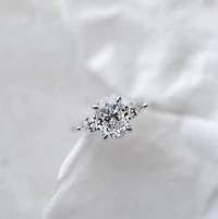Oval Trilogy Engagement Ring with 2.56 Carat TW of Diamonds in 18kt White Gold