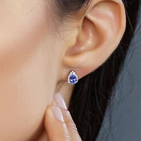Earrings with .12 Carat TW of Diamonds and Tanzanite in 10kt White Gold