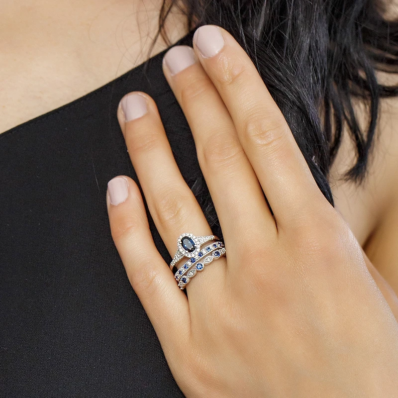 Ring with Blue Sapphire and .20 Carat TW of Diamonds in 10kt White Gold