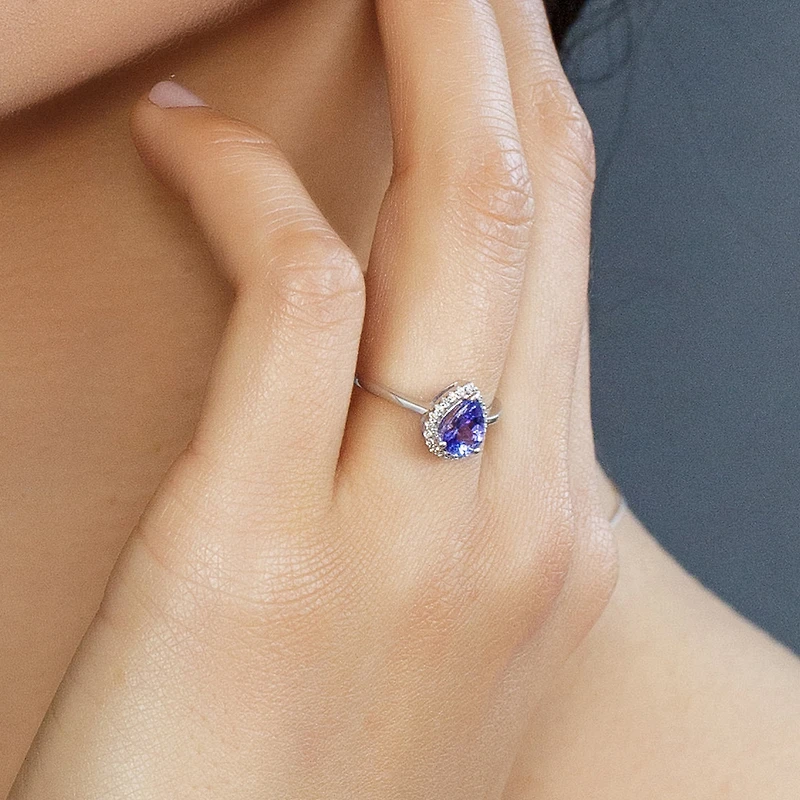 Ring with Tanzanite and .09 Carat TW of Diamonds in 10kt White Gold