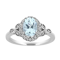 Ring with 6X8 Oval Aquamarine and .20 Carat TW of Diamonds in 10kt White Gold