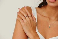 Ring with 4X2MM Emerald Cut Blue Sapphire and .15 Carat TW of Diamond in 10kt Yellow Gold