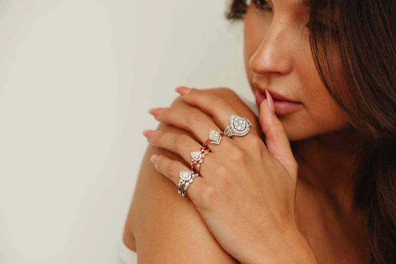 Halo Engagement Ring with .63 Carat TW of Diamonds in 14kt White Gold