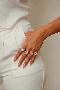 Halo Engagement Ring with .63 Carat TW of Diamonds in 14kt White Gold