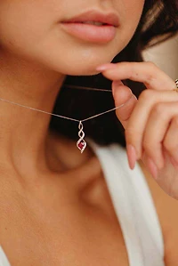 Pendant with Ruby and .05 Carat TW of Diamonds in 10kt White Gold