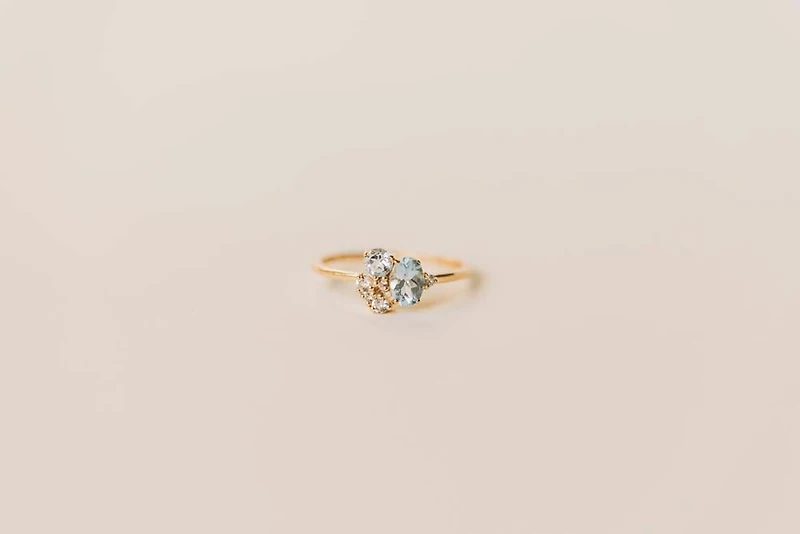 Ring with 6X4MM Oval Blue Topaz, Round Aquamarine and Blue Topaz in 10kt Yellow Gold