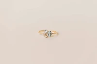 Ring with 6X4MM Oval Blue Topaz, Round Aquamarine and Blue Topaz in 10kt Yellow Gold