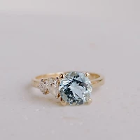Ring with 8MM Round Aquamarine and .15 Carat TW of Diamonds in 14kt Yellow Gold