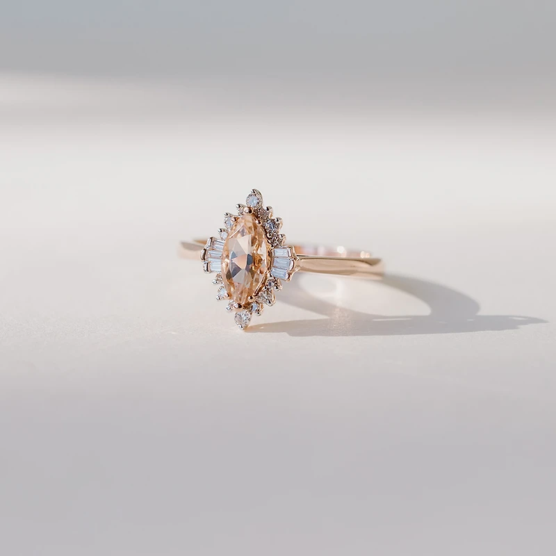 Ring with 8X4MM Marquise Morganite and .15 Carat TW of Diamonds in 14kt Rose Gold
