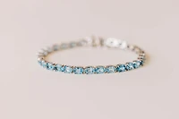 7.5″ Tennis Bracelet with Blue Topaz in Sterling Silver