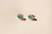 Halo Earrings with .17 Carat TW of Diamonds and 6x4MM Oval Emerald in 10kt White Gold
