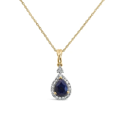 Halo Pendant with .13 Carat TW of Diamonds and 7x5MM Pear Shape Blue Sapphire in 10kt Yellow Gold with Chain
