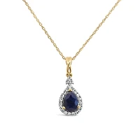 Halo Pendant with .13 Carat TW of Diamonds and 7x5MM Pear Shape Blue Sapphire in 10kt Yellow Gold with Chain