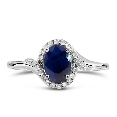 Halo Ring with .10 Carat TW of Diamonds and 7x5MM Oval Blue Sapphire in 10kt White Gold