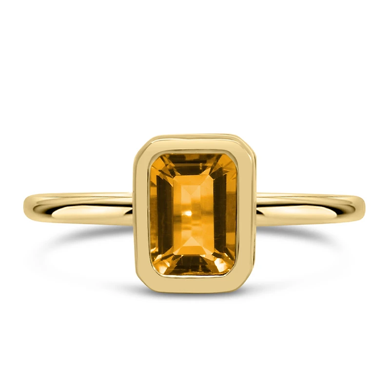 Ring with 7x5MM Emerald Cut Citrine in 10kt Yellow Gold