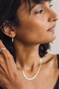 Dangling Star Chain Earrings with .03 Carat TW of Diamonds in 10kt Yellow Gold