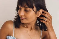 Dangling Star Chain Earrings with .03 Carat TW of Diamonds in 10kt Yellow Gold