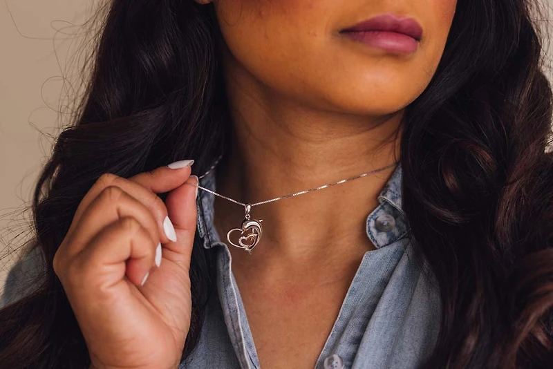 Dolphin Heart Pendant with .05 Carat TW of Diamonds in Sterling Silver with Chain