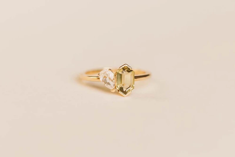 Ring with 7X5MM Elongated Hexagon Olive Quartz and White Topaz in 14KT Yellow Gold