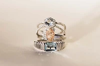 Ring with 9X6MM Pear Shape Rutilated Quartz and White Topaz in 14KT White Gold