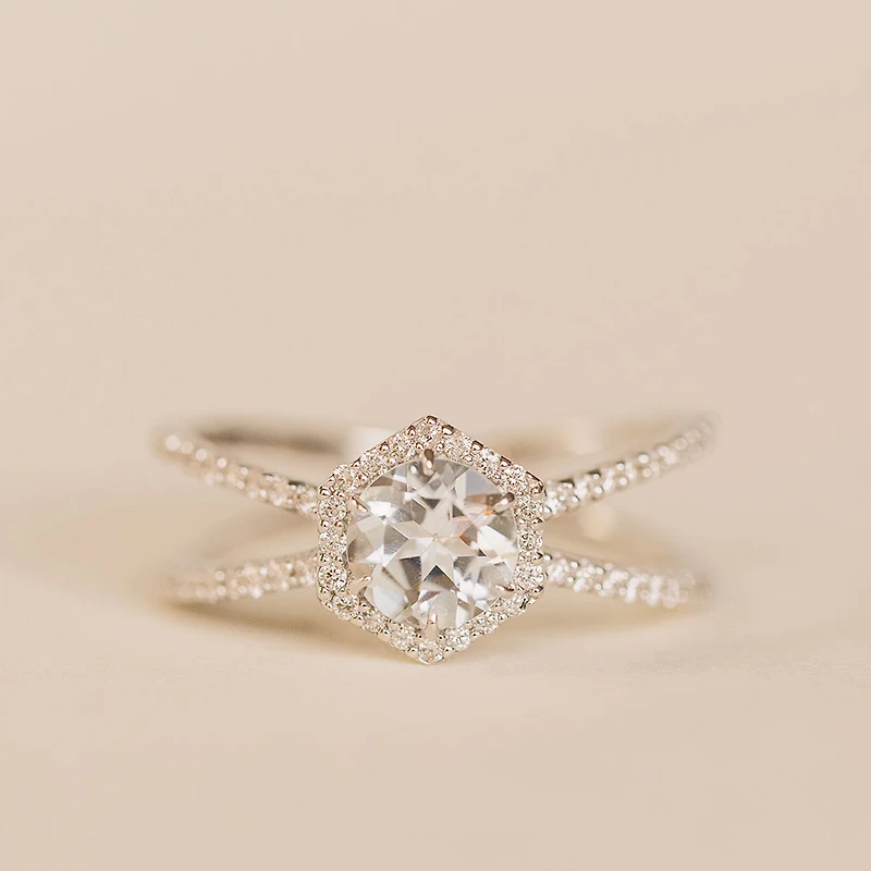 Ring with 6MM Round Aquamarine and .26 Carat TW of Diamonds in 14KT White Gold