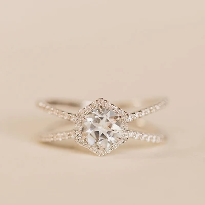 Ring with 6MM Round Aquamarine and .26 Carat TW of Diamonds in 14KT White Gold