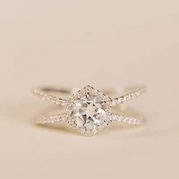 Ring with 6MM Round Aquamarine and .26 Carat TW of Diamonds in 14KT White Gold