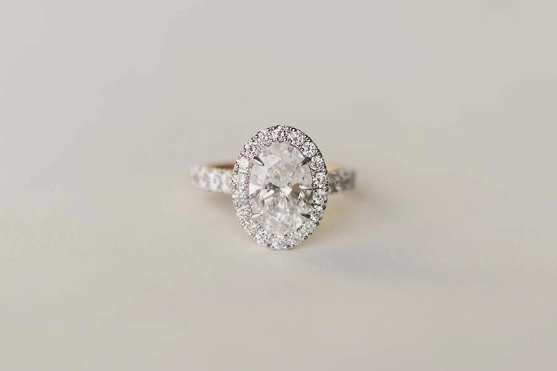 Oval Halo Engagement Ring with 4.20 Carat TW of Lab Created Diamonds in 14kt Yellow and White Gold