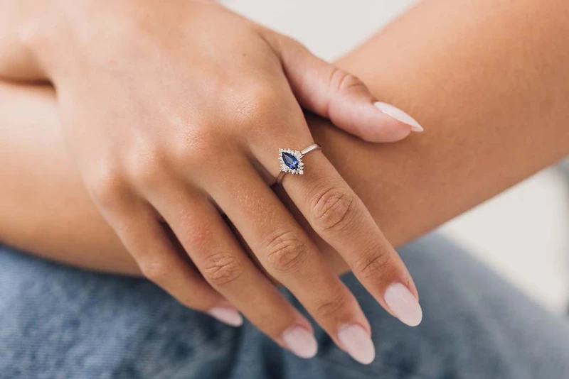 Ring with .15 Carat TW of Diamonds and Marquise Blue Sapphire in 14kt White Gold
