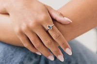 Ring with .15 Carat TW of Diamonds and Marquise Blue Sapphire in 14kt White Gold