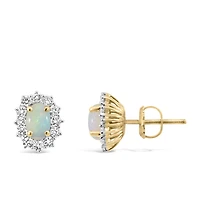 Earrings with .50 Carat TW of Diamonds and 7x5MM Opal in 14kt Yellow Gold