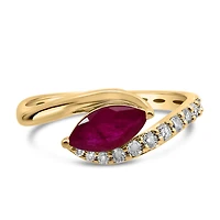 Ring with Marquise Ruby and .25 Carat TW of Diamonds in 10kt Yellow Gold