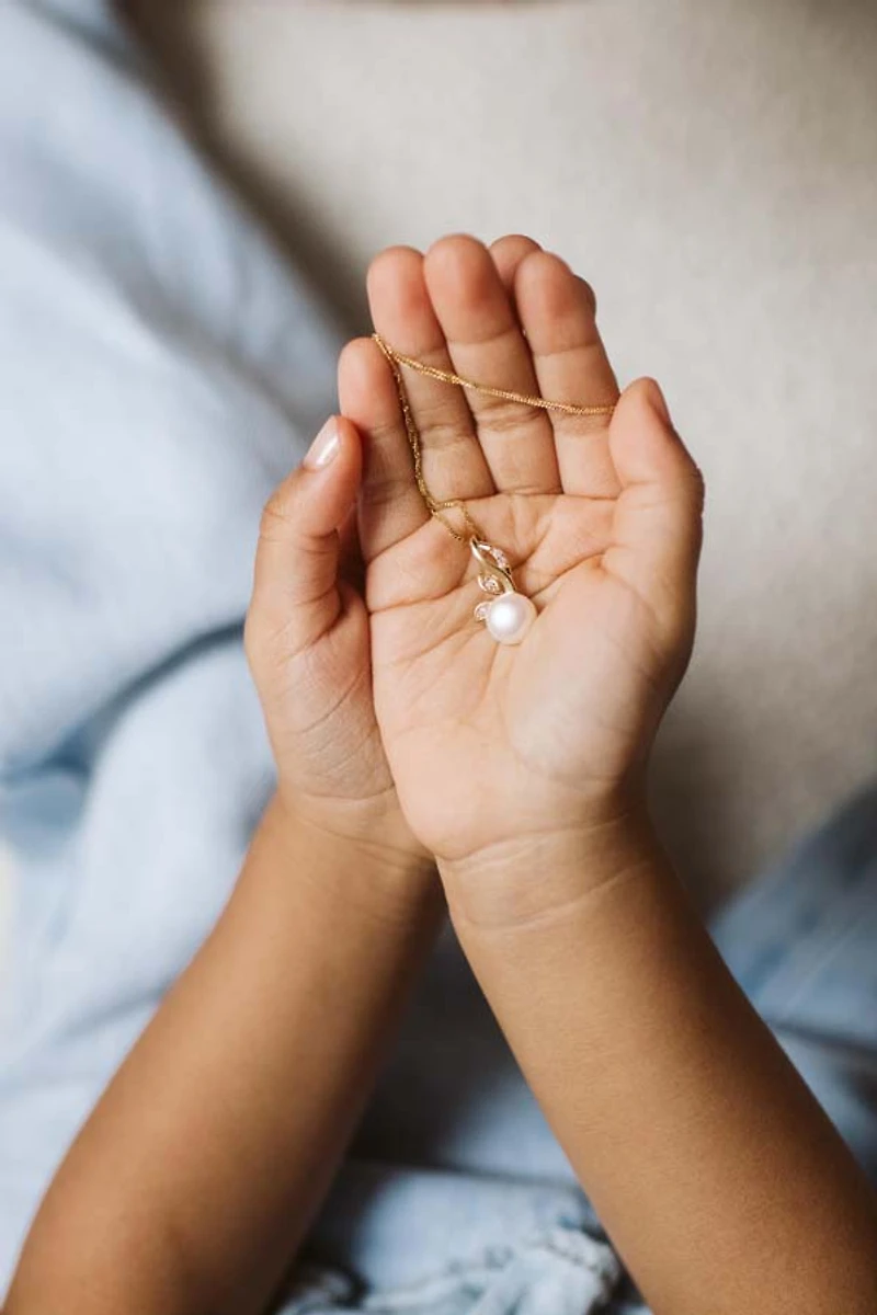 Pendant with 8.5mm Freshwater Pearl and .04 Carat TW of Diamonds in 10kt Yellow Gold with Chain