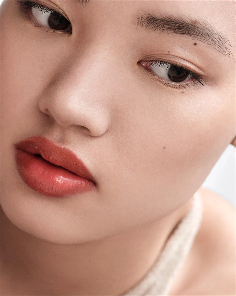 Prada Optimizing Care lip balm - U011 - NOISETTE