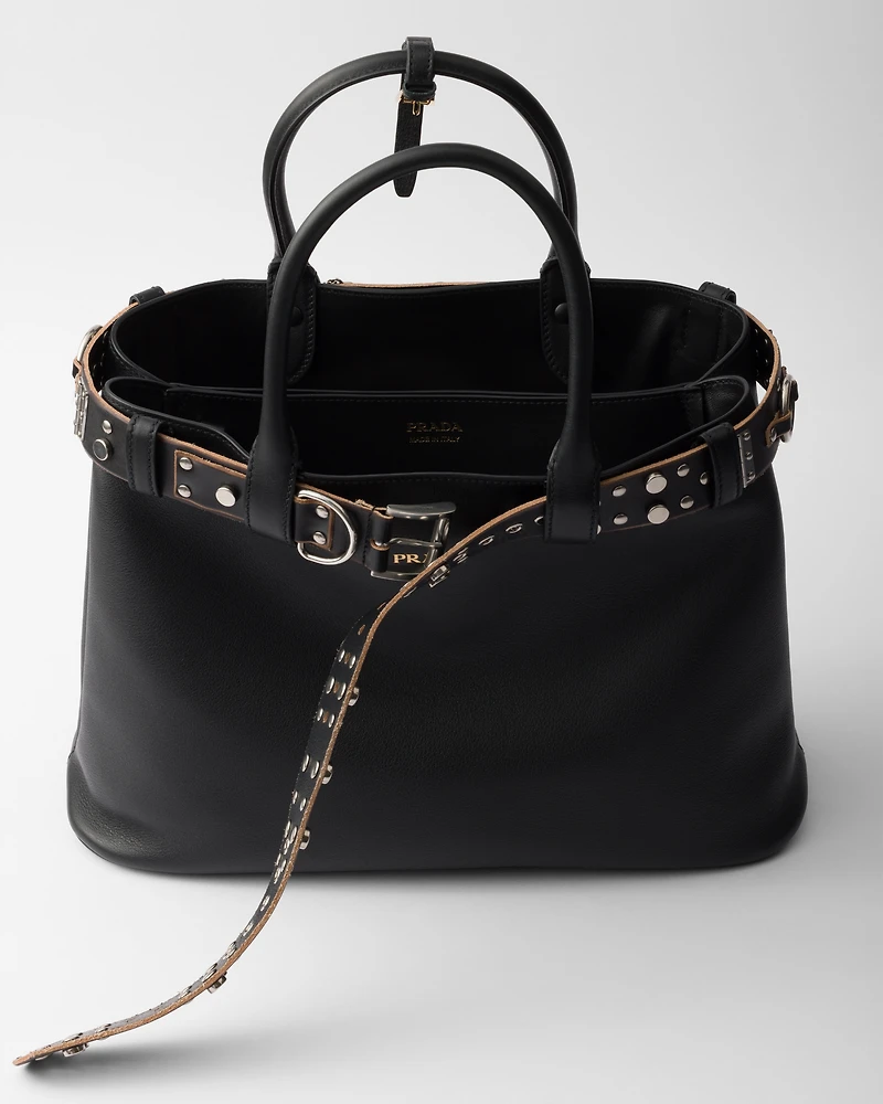 Prada Buckle leather bag with studded belt