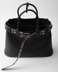 Prada Buckle leather bag with studded belt