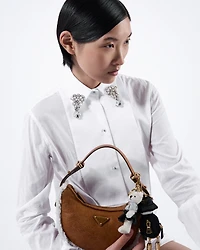 Prada Arqué small shearling shoulder bag