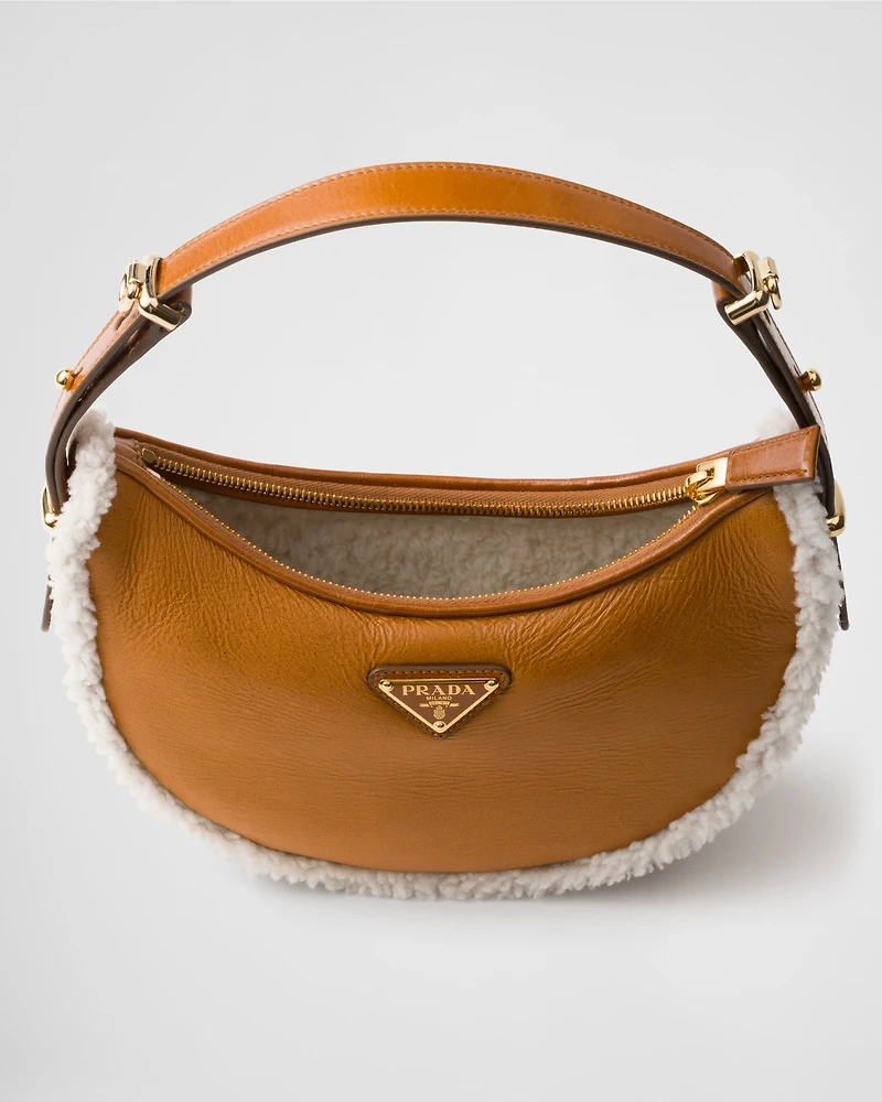 Prada Arqué small shearling shoulder bag