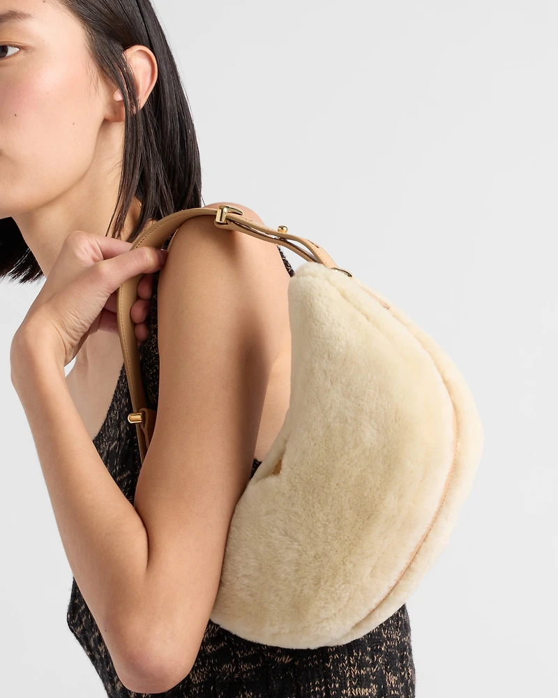 Prada Arqué shearling and leather shoulder bag