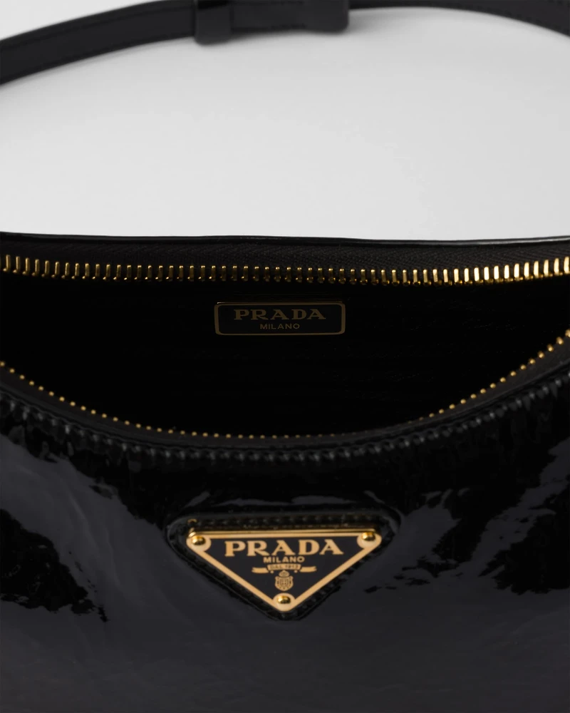 Prada Re-Edition mini naplak patent leather bag