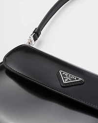 Prada Cleo small brushed leather shoulder bag with flap