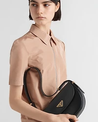 Prada Arqué leather shoulder bag with flap