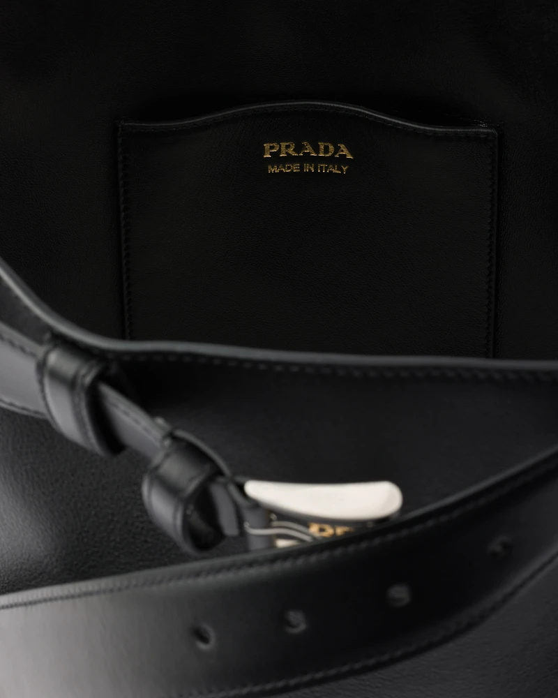 Prada Buckle leather bucket bag with belt