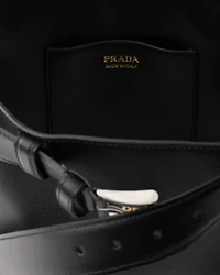 Prada Buckle leather bucket bag with belt