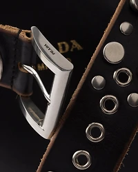 Prada Buckle leather bucket bag with studded belt