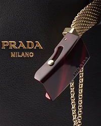 Prada Buckle leather bucket bag with jeweled belt